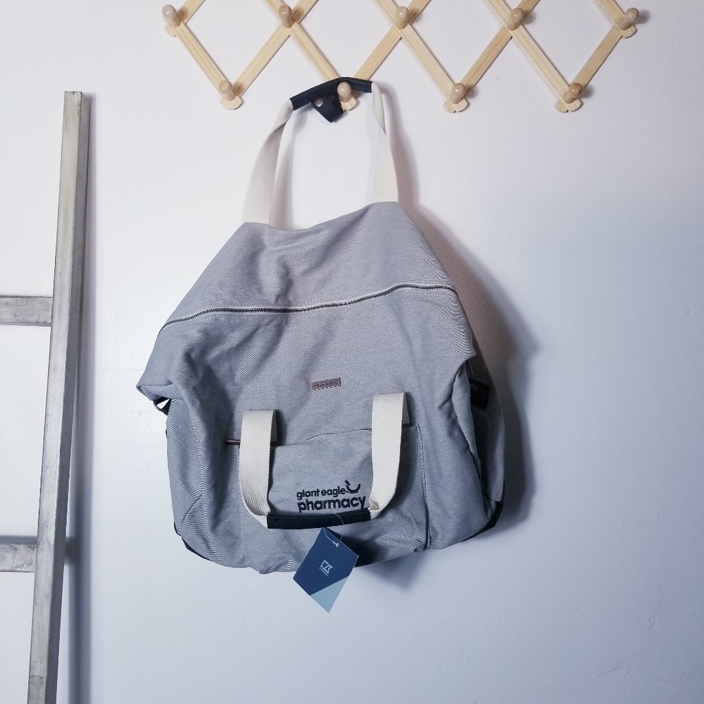 NWT CUTTER & BUCK DUFFLE BAG GRAY AND CREAM STRIPED WITH BLACK BOTTOM